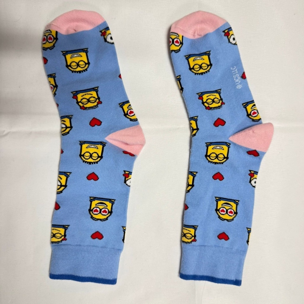Light blue crew socks‎ with a yellow character pattern- NEW in Bag,